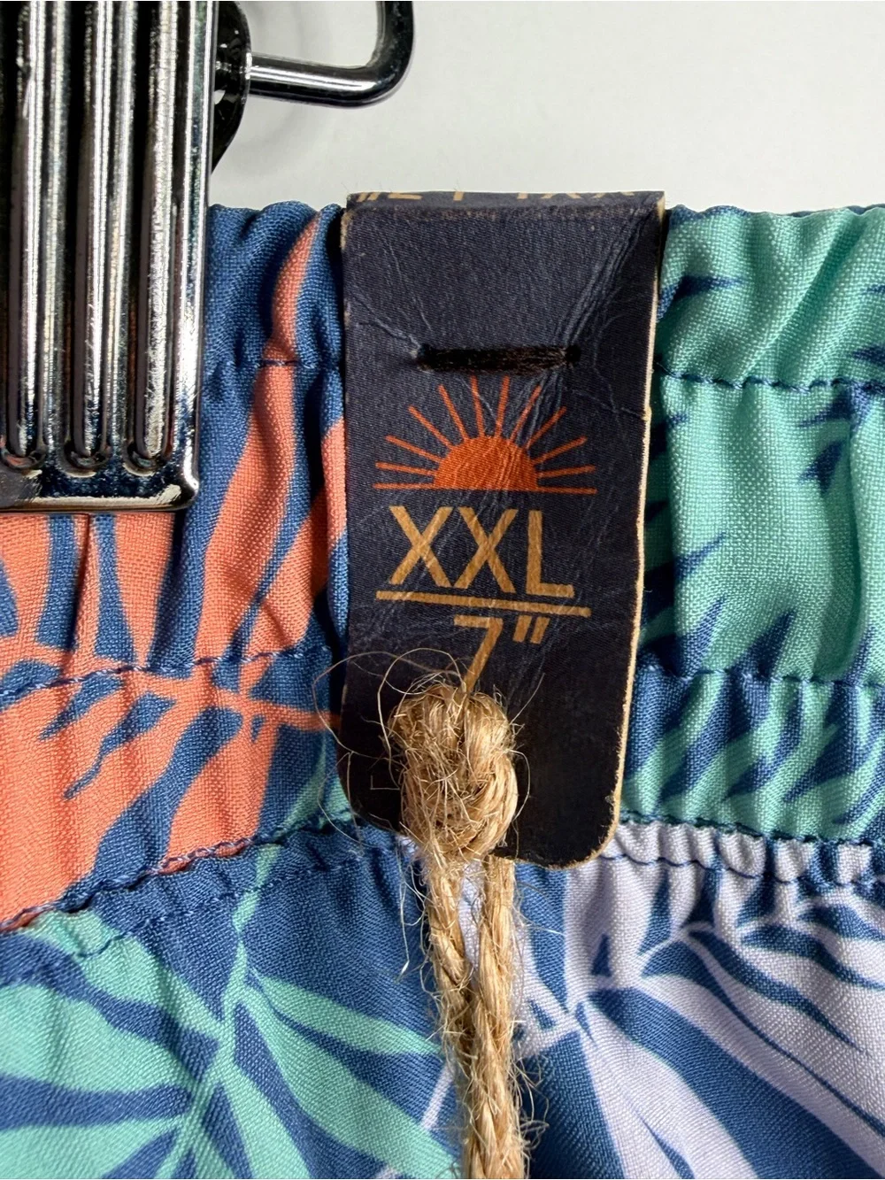 Faherty Navy Swim Shorts with Coral & Mint Leaf Print